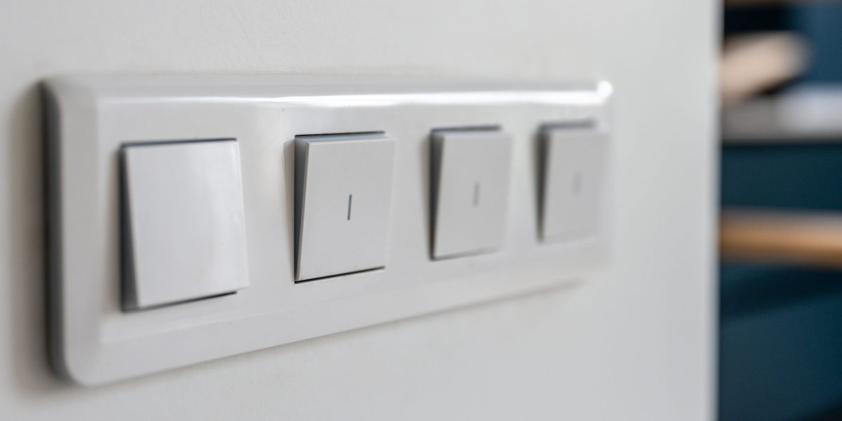 four-light-switches-macro-with-bokeh-background-minimal-design-scaled.jpg - StiriFresh