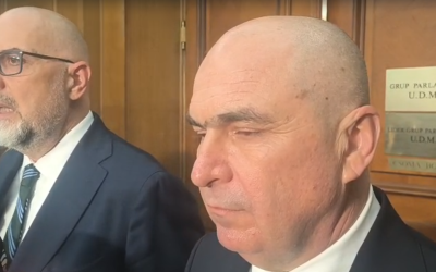 Guvernul în derivă: Bolojan negociază cu UDMR pentru ieșirea din criză
