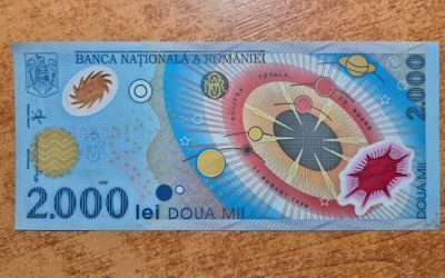 Bancnota de 2.000 lei cu eclipsa: Cât valorează azi? Ce caută colecționarii