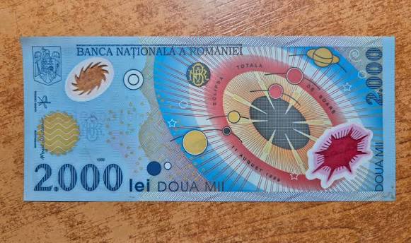 Bancnota de 2.000 lei cu eclipsa: Cât valorează azi? Ce caută colecționarii